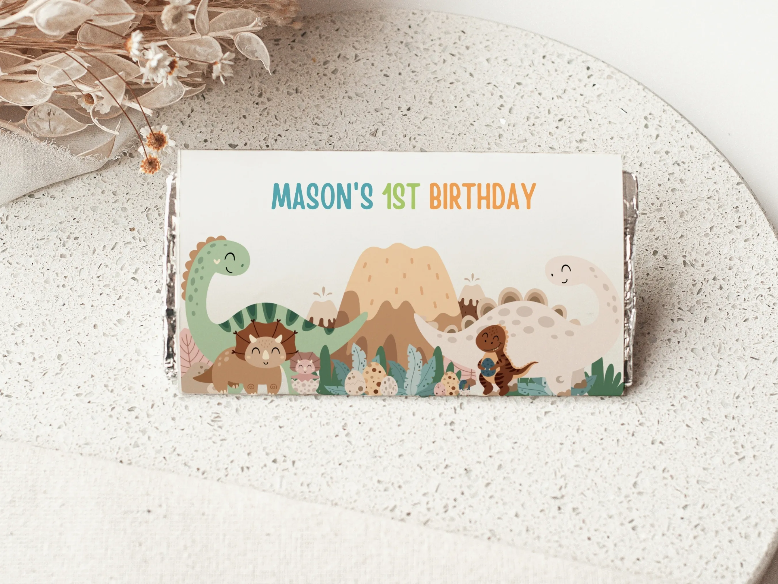 Baby boy dinosaur chocolate wrapper with blue dino theme, matching candy wrappers and candy bar labels, editable Canva template by fllcdesigns