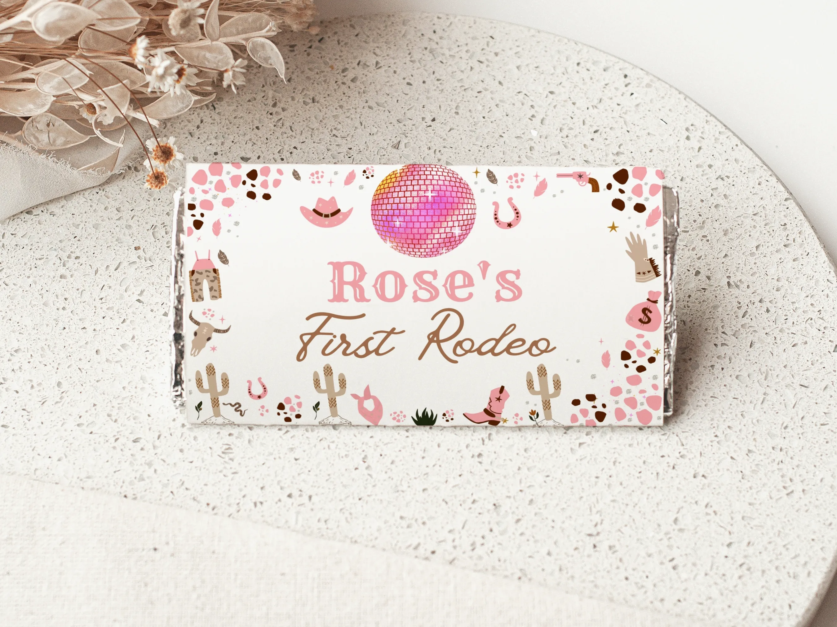 Disco Cowgirl First Rodeo chocolate wrappers with pink western theme, mini candy bar labels, editable Canva template by fllcdesigns