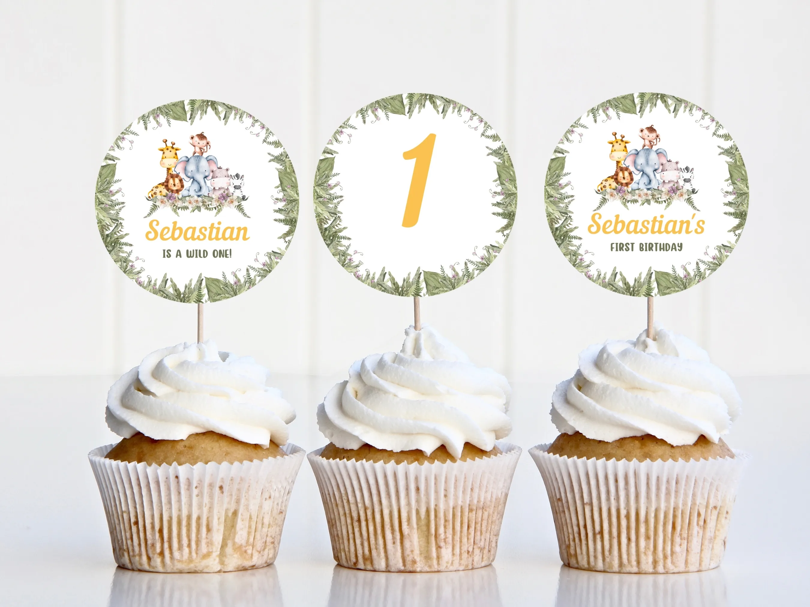 Wild One safari cupcake toppers with jungle animal designs and matching birthday cake topper, editable Canva template by fllcdesigns