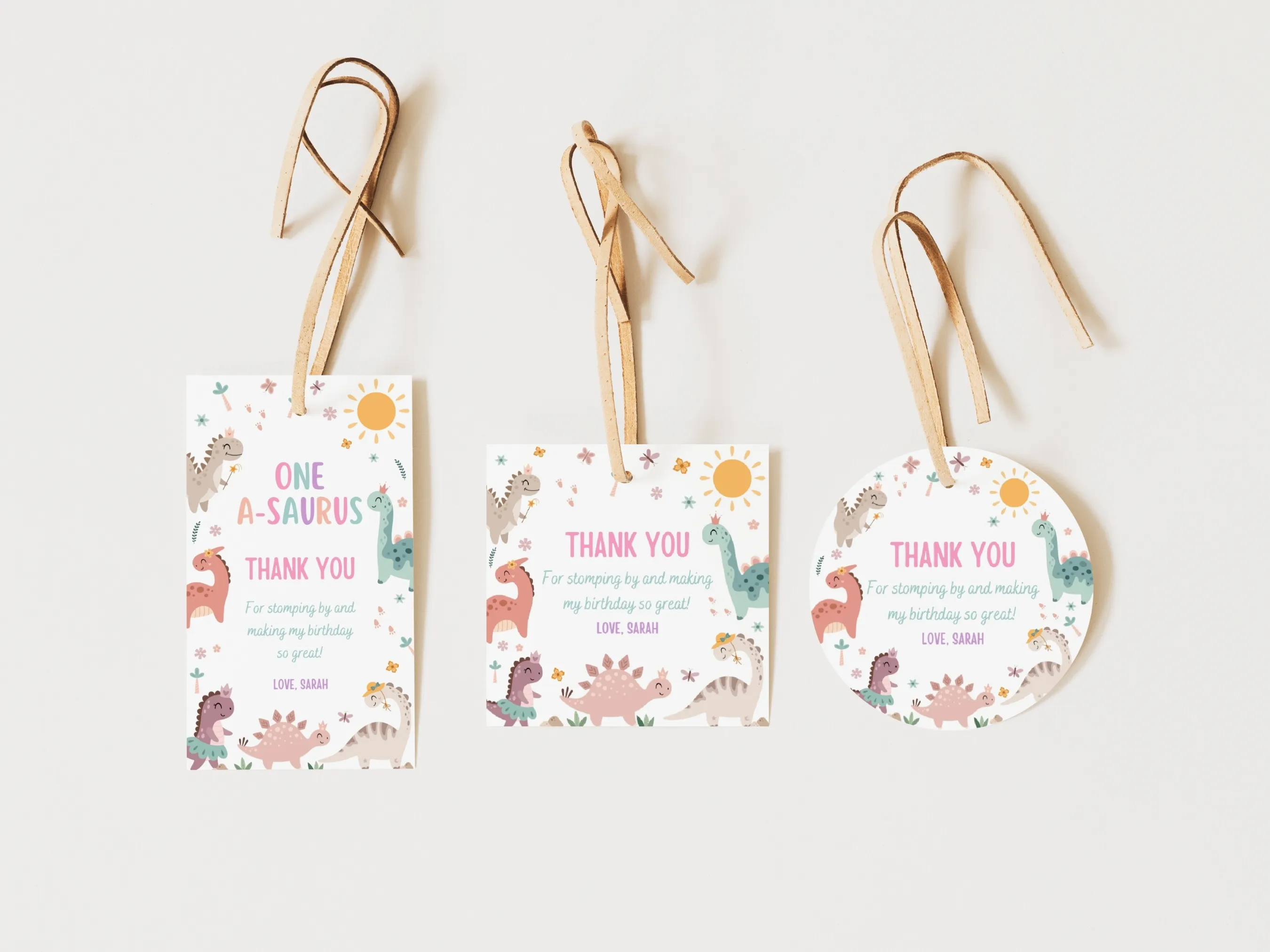 Baby girl dinosaur birthday thank you tags with cute pink dino design, girly party favor labels, editable Canva template by fllcdesigns