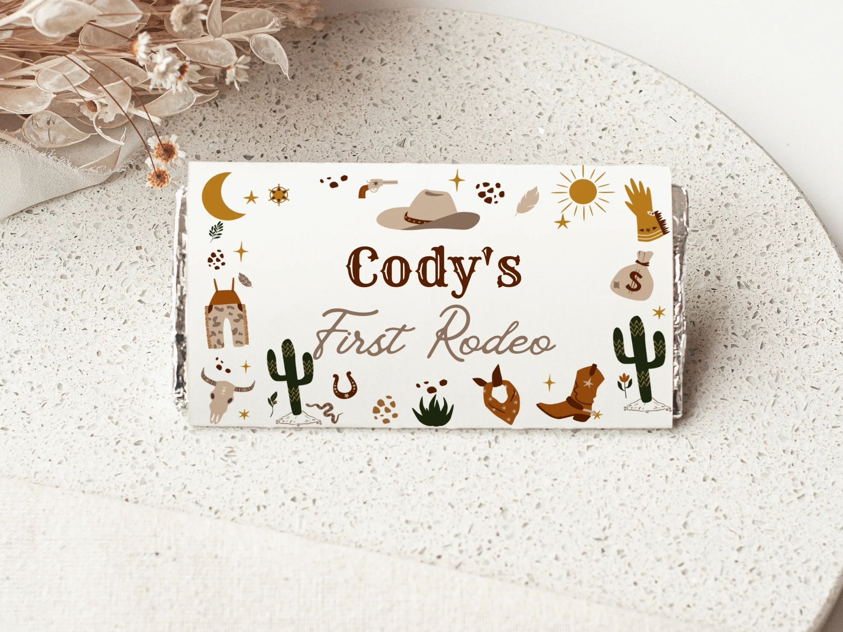 Cowboy First Rodeo chocolate wrappers with western theme, cowboy hat and rope design, editable Canva candy bar labels by fllcdesigns
