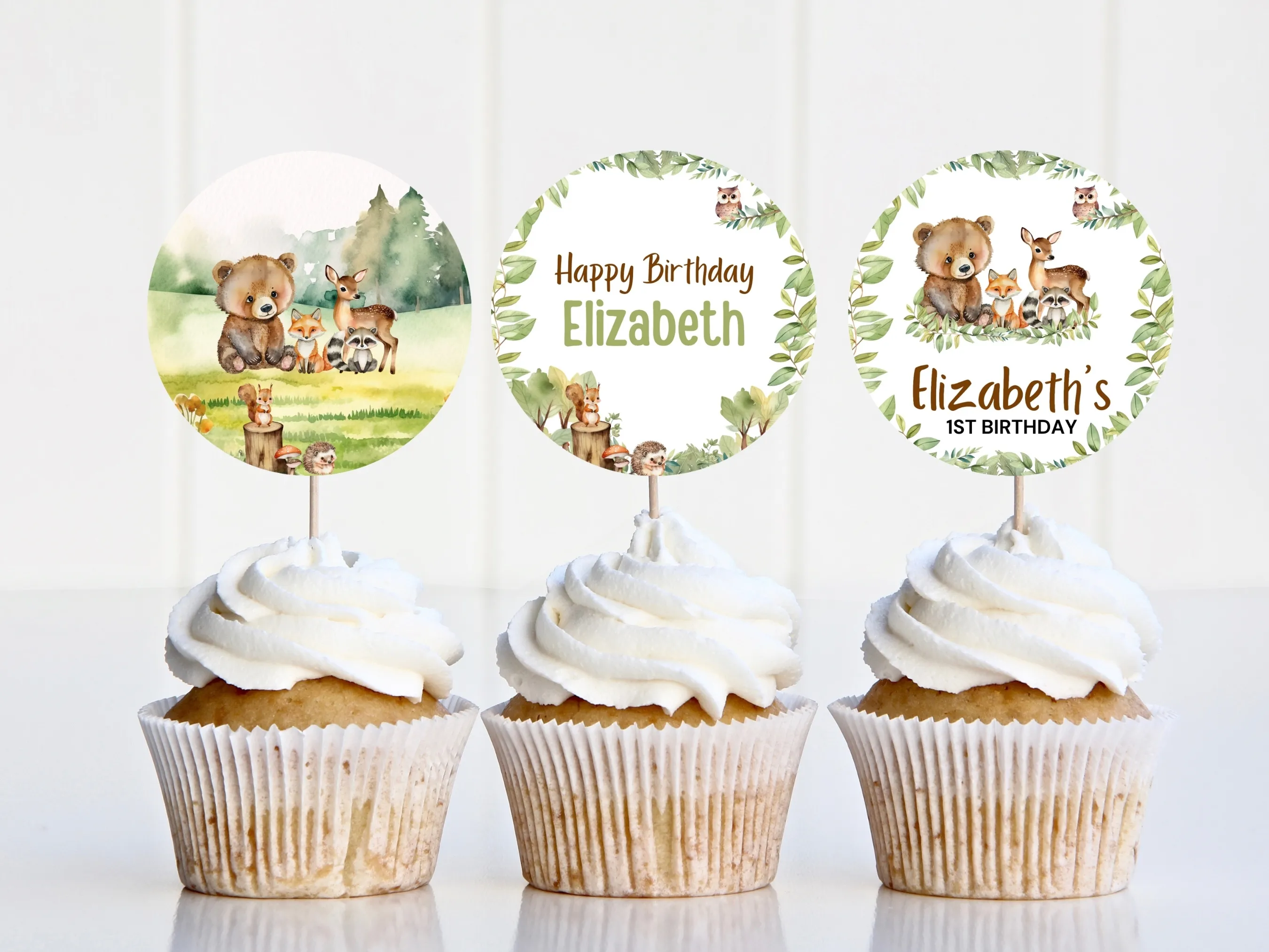 Woodland Happy Birthday cupcake toppers with forest animal designs and matching “One” cake topper for Wild One parties, editable Canva template by fllcdesigns
