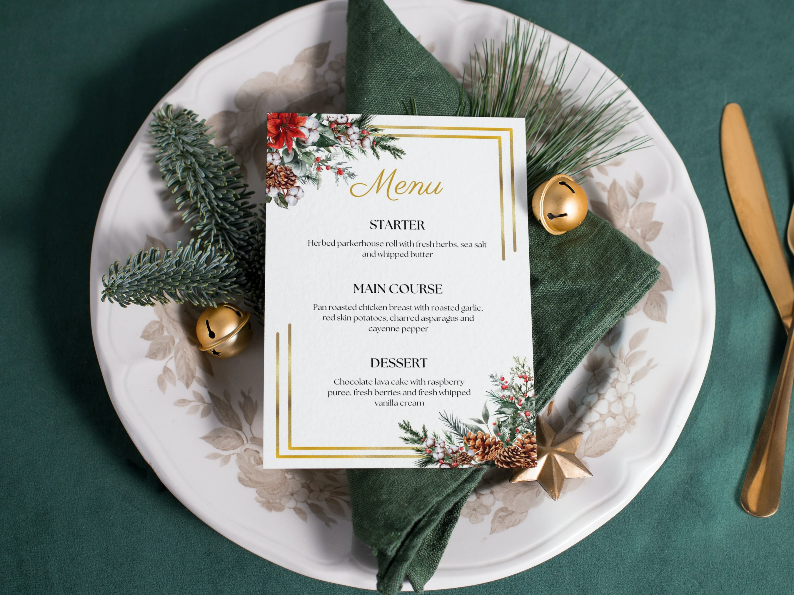 Golden Christmas dinner menu card displayed on an elegant holiday place setting with festive greenery, pinecones, red berries, gold frame details and editable Canva template.