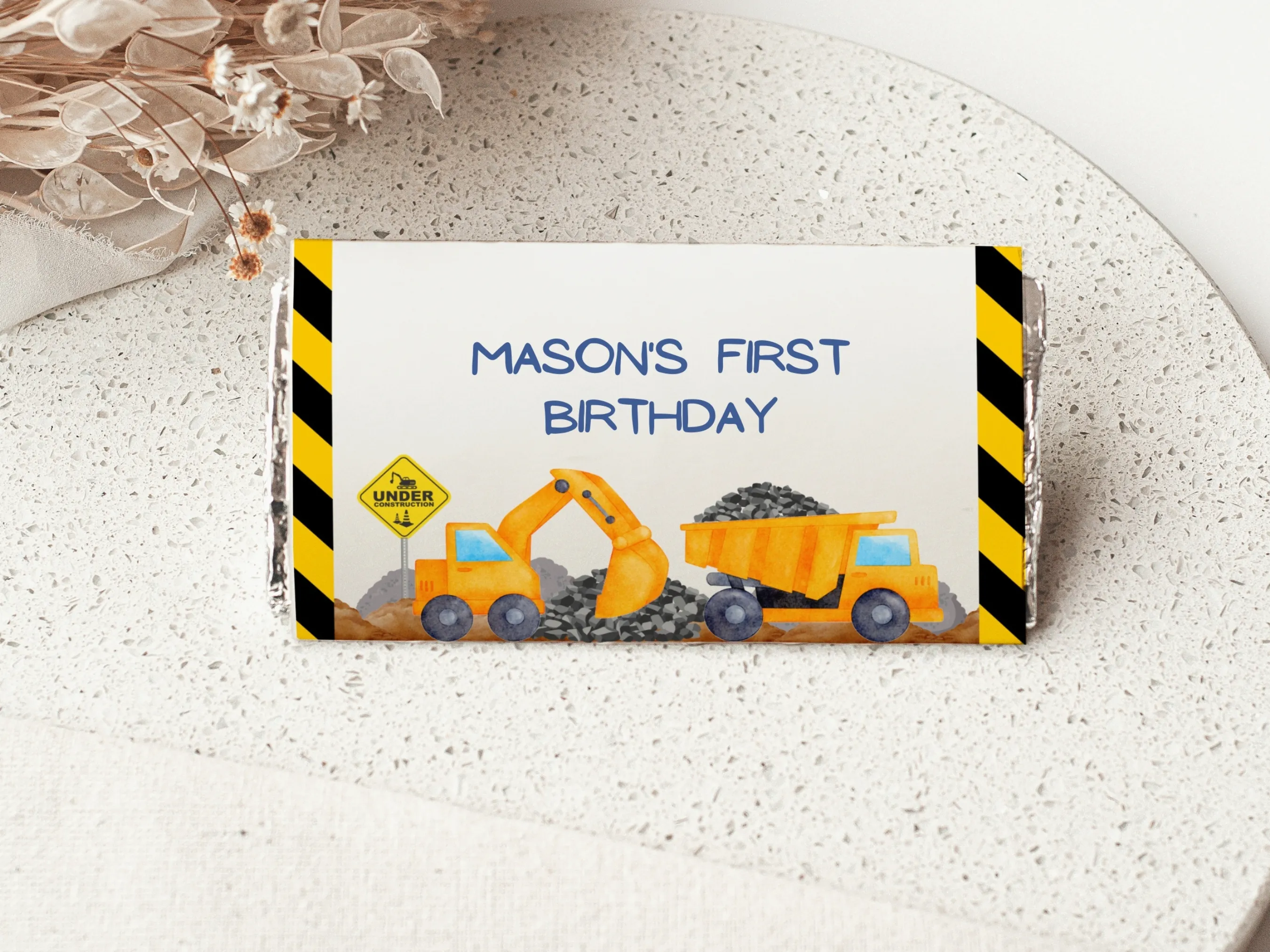 Construction birthday chocolate wrappers with excavator and dump truck design, matching candy wrappers and candy bar labels, editable Canva template by fllcdesigns