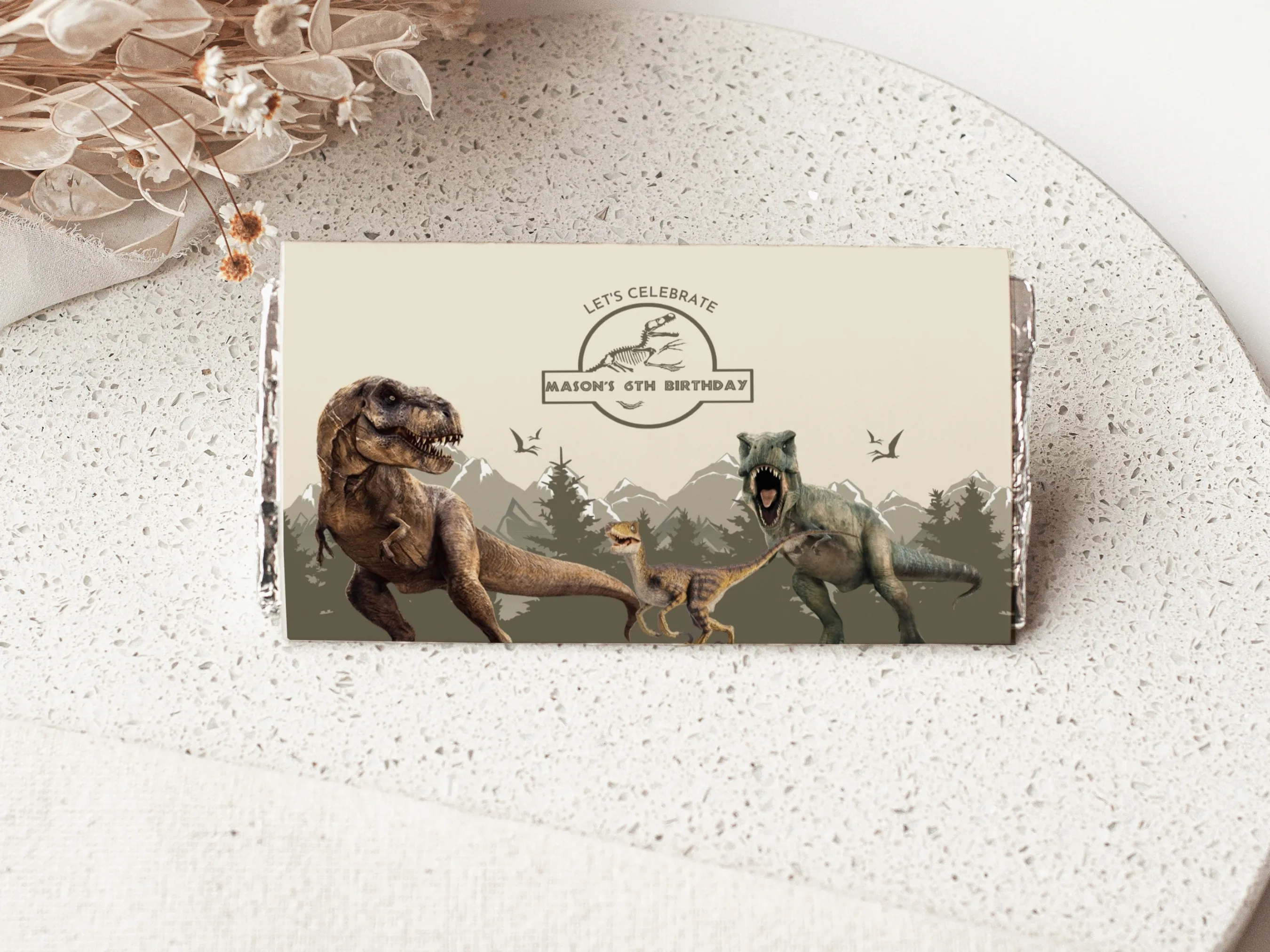 Dinosaur birthday chocolate wrapper with Jurassic T-Rex theme, matching candy wrappers and candy bar labels, editable Canva template by fllcdesigns