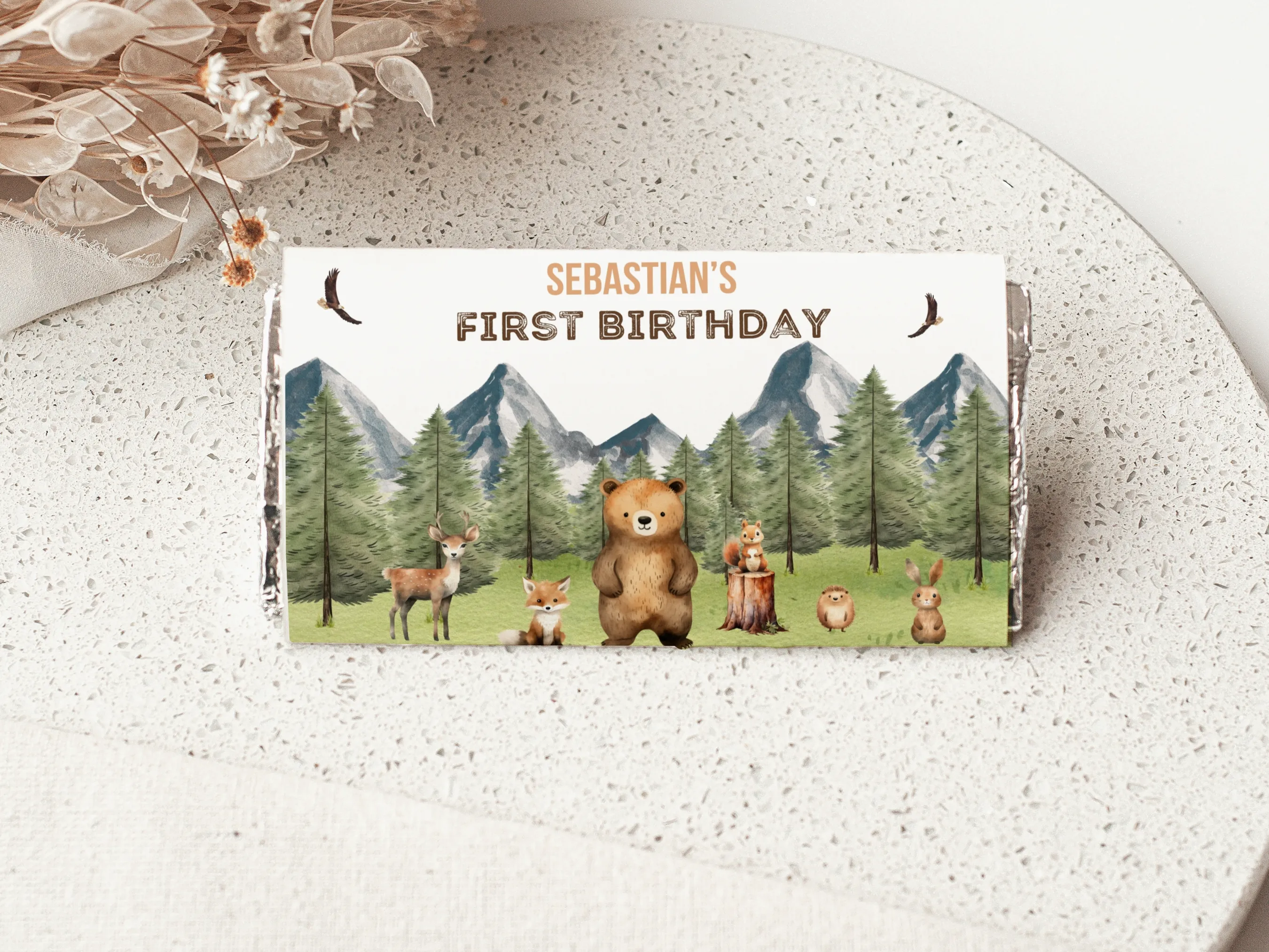 Woodland animals birthday chocolate wrappers with Wild One forest theme, matching candy wrappers and candy bar labels, editable Canva template by fllcdesigns