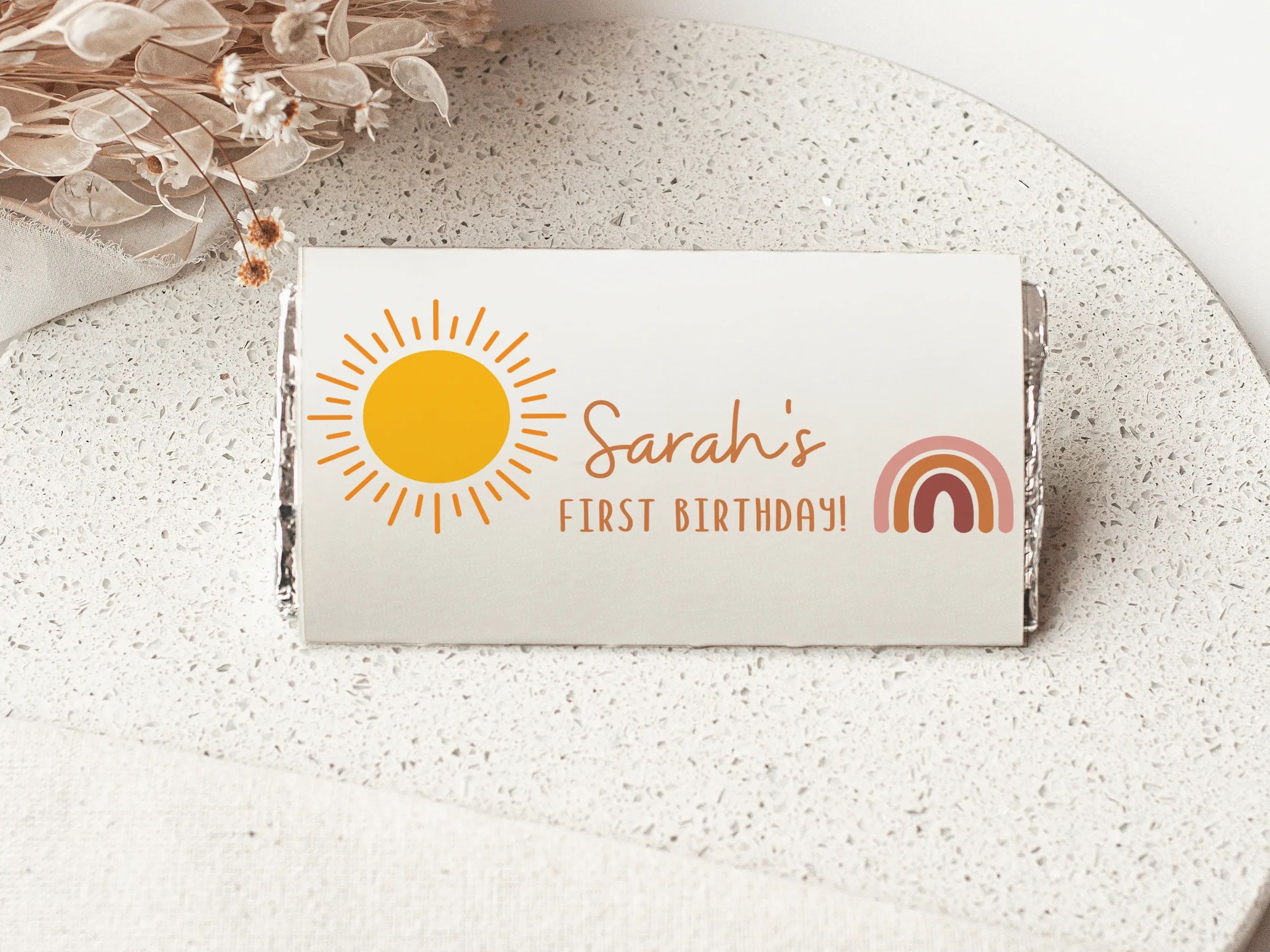 Sunshine 1st birthday chocolate wrappers with boho rainbow and sun design, matching candy wrappers and candy bar labels, editable Canva template by fllcdesigns
