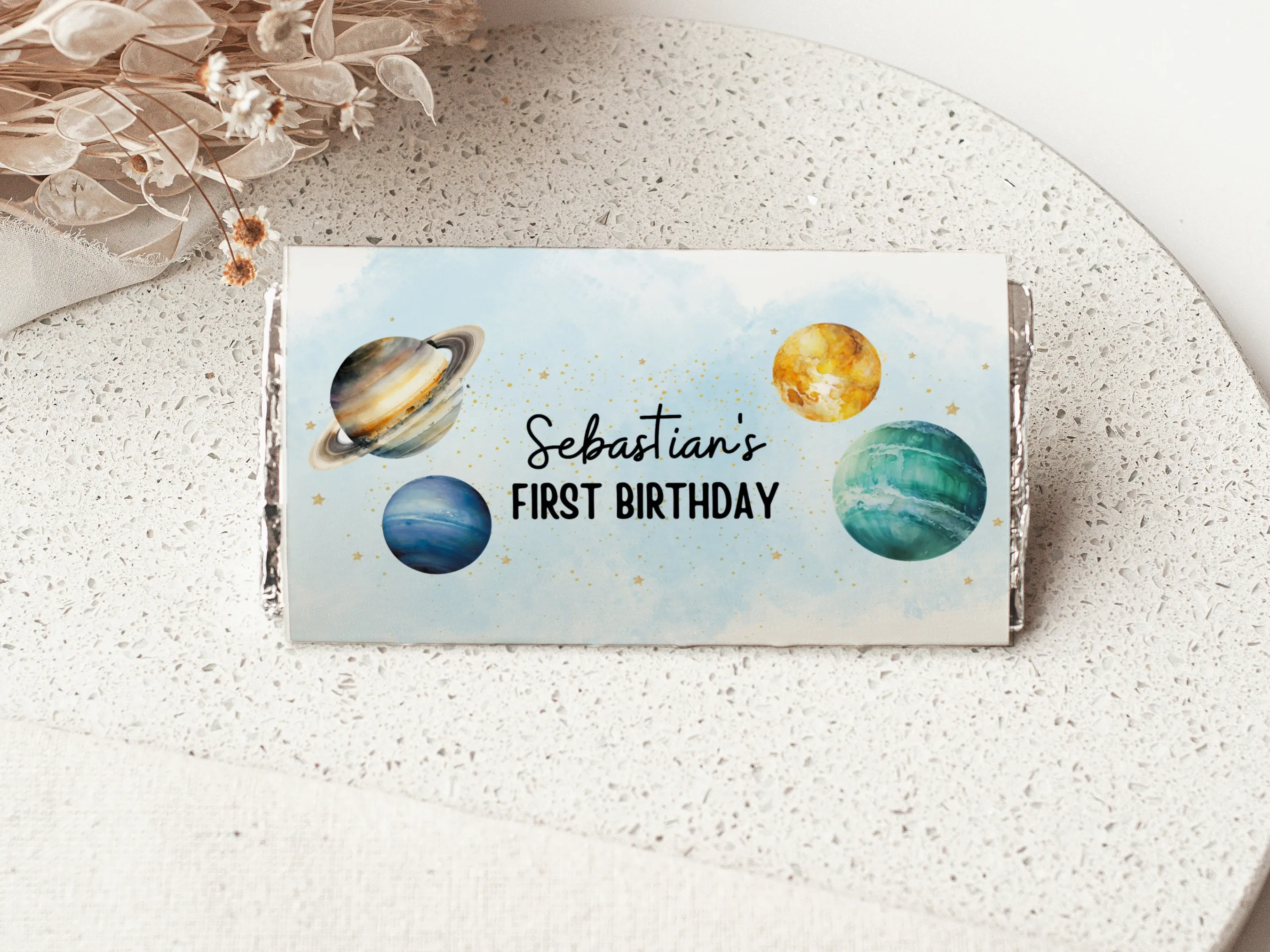 First Trip Around the Sun chocolate wrappers with outer space theme, planets and stars, matching candy wrappers and candy bar labels, editable Canva template by fllcdesigns