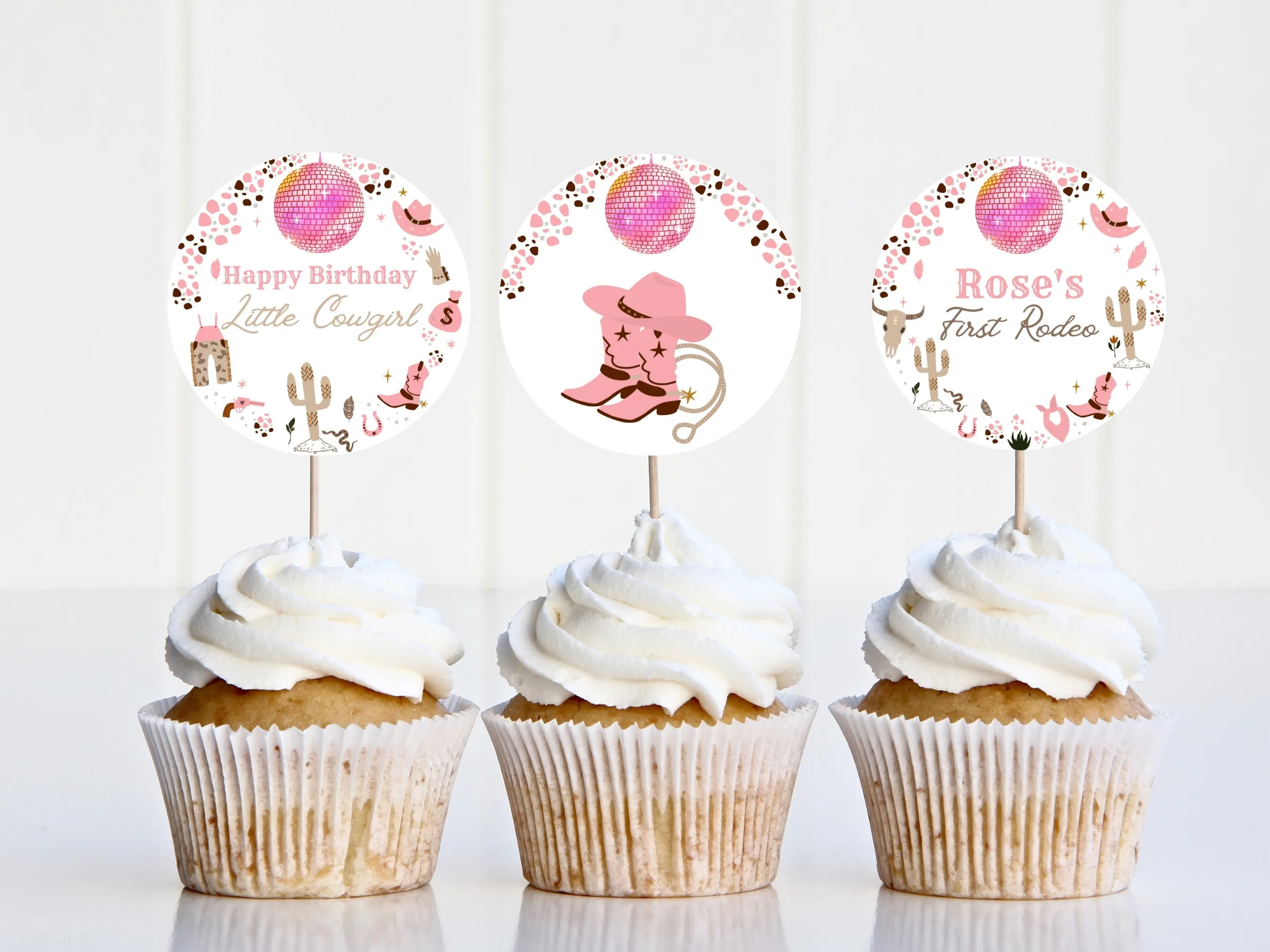 Disco Cowgirl My First Rodeo cupcake toppers with pink western and space cowgirl theme, custom cake topper elements, editable Canva template by fllcdesigns