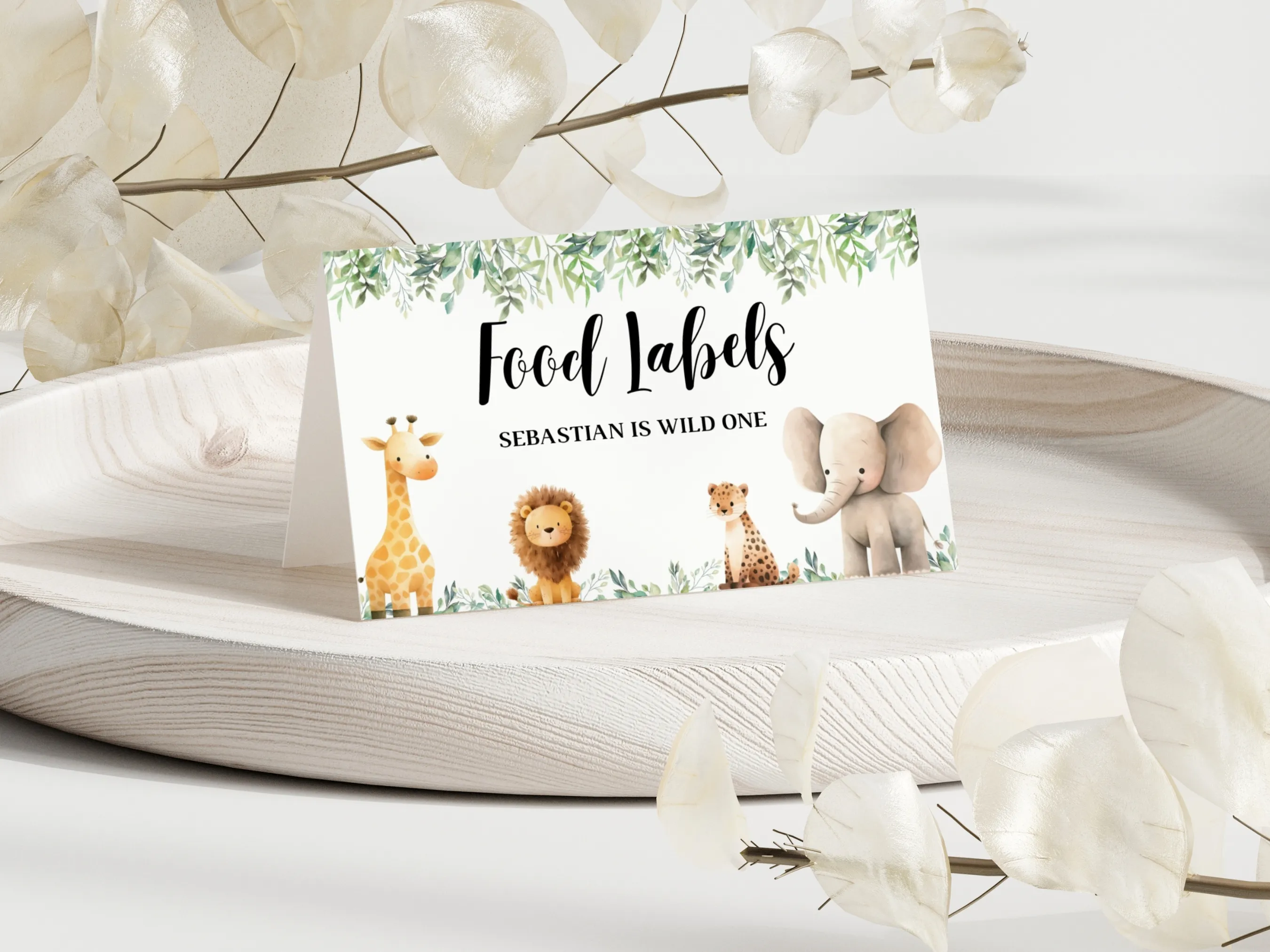 Wild One safari food tent cards with jungle animals design, printable table labels and name tags, editable Canva template by fllcdesigns