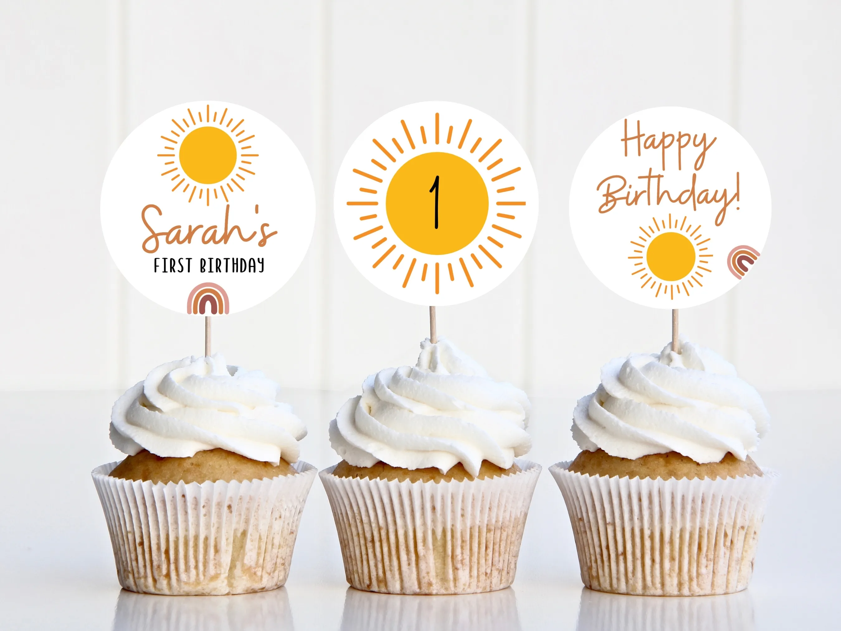 First Trip Around the Sun boho sunshine cupcake toppers with matching “One” cake topper for 1st birthday girls, editable Canva template by fllcdesigns