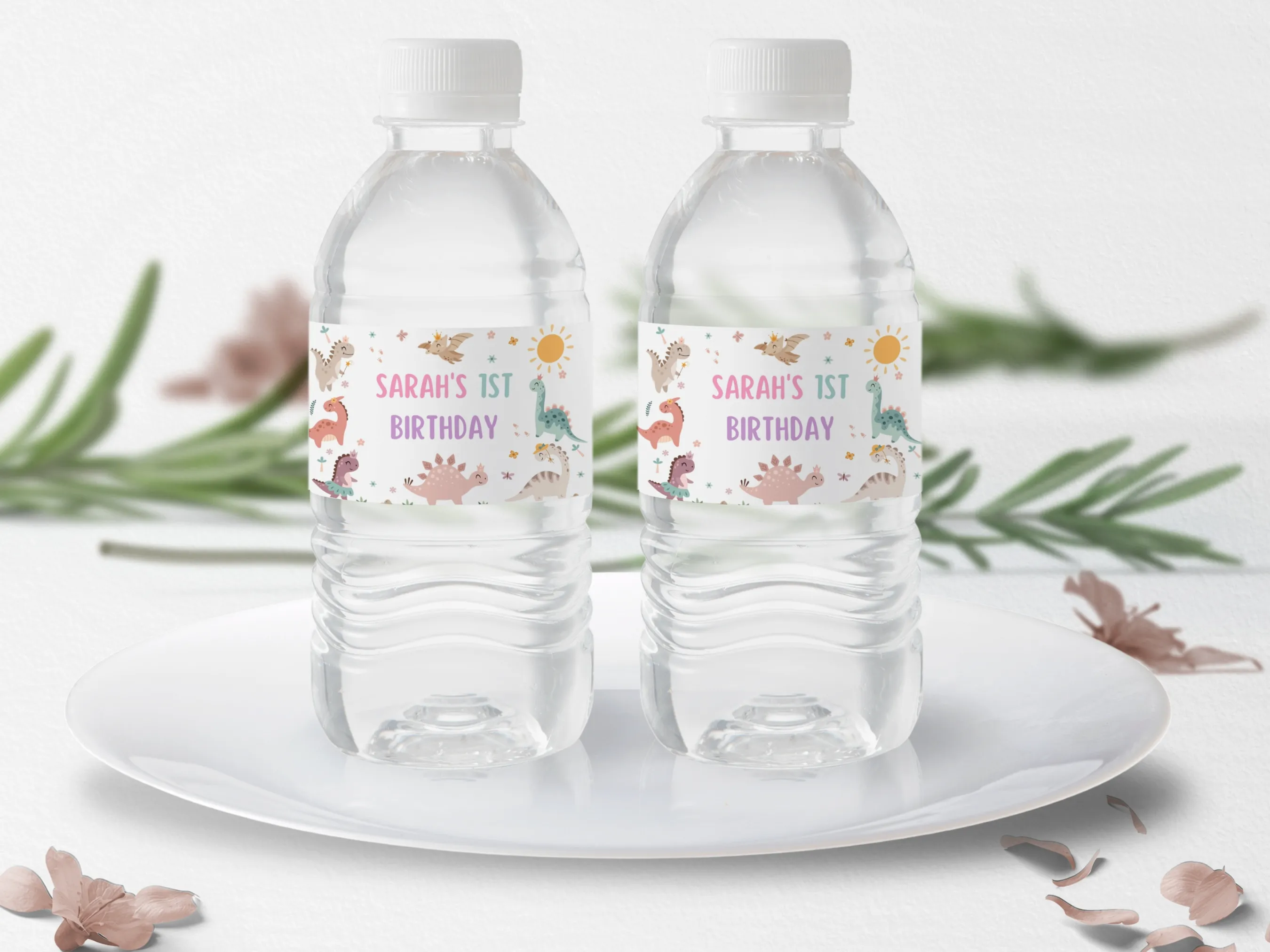 Baby girl dinosaur birthday water bottle labels with pink dino design, editable bottle wraps and bottle stickers by fllcdesigns