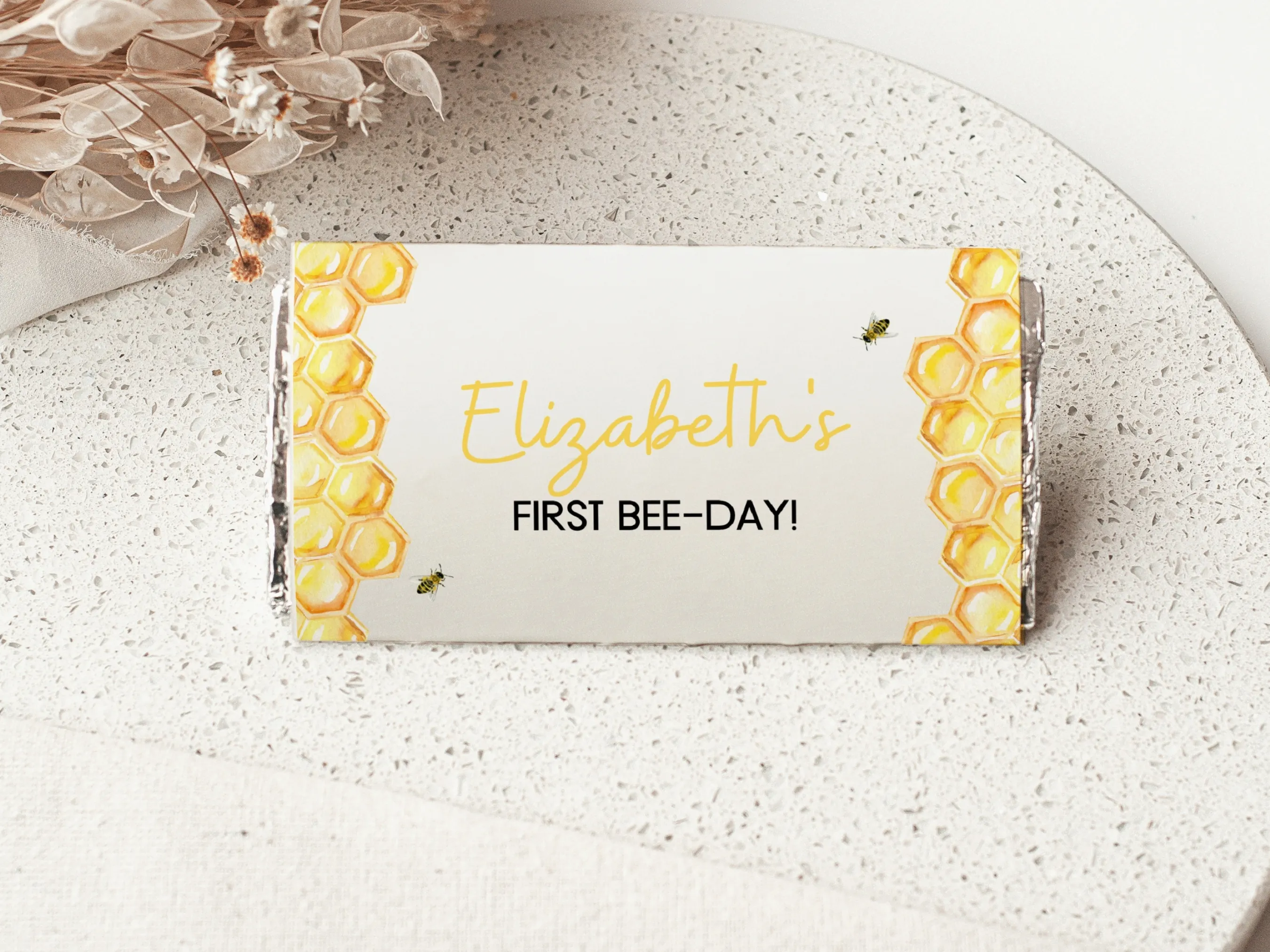 First Bee Day chocolate wrappers with honeybee design, yellow bee candy bar labels, editable Canva template by fllcdesigns